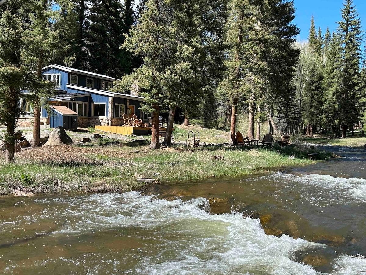 Main cabin with deck and fire pit right on the Creek!